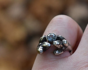 Oak Sapling ring with teal sapphire, 9 colorless diamonds in silver