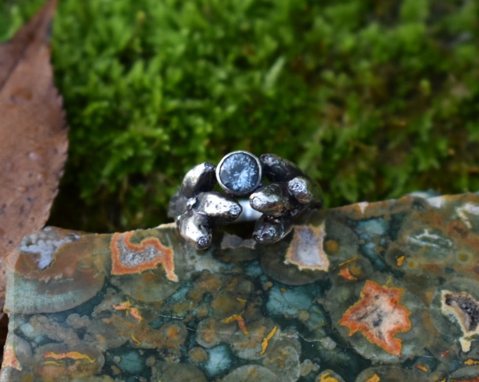 Oak Sapling ring with teal sapphire, 9 colorless diamonds in silver