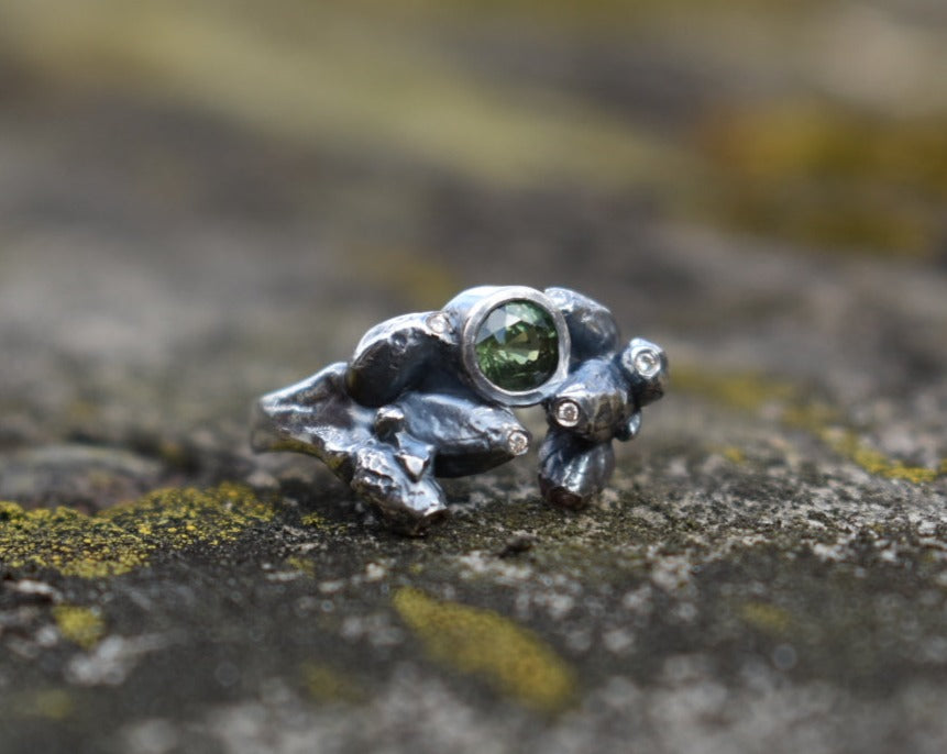 Oak sapling branch ring with green sapphire and white diamonds