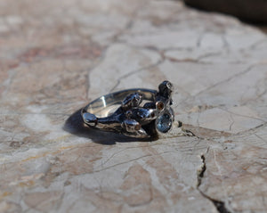 Oak sapling ring with blue sapphire and champagne diamonds