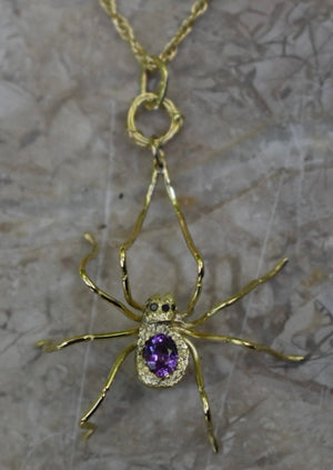 18ky gld spider pendant with color-change sapphire, black diamond eyes