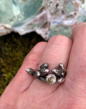 Oak sapling ring with colorless diamonds and 1/2 carat color change yellow sapphire with zinnia cut.