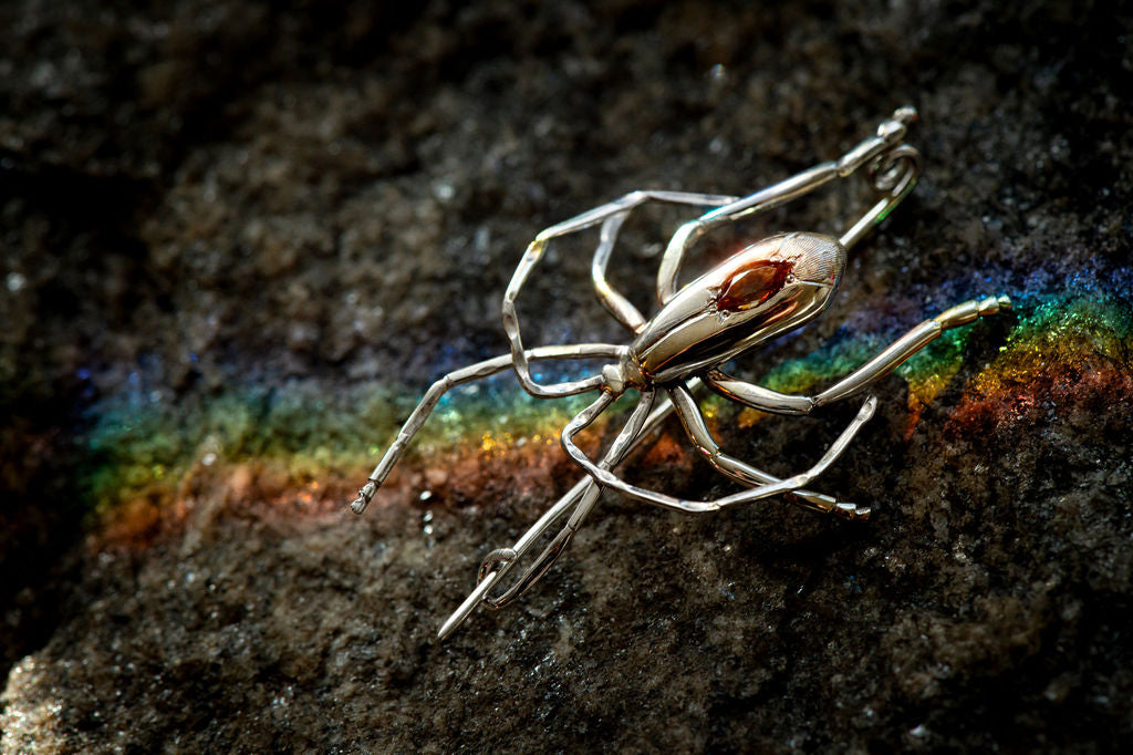 Silver true bug brooch with hand engraving and andaluscite marquise