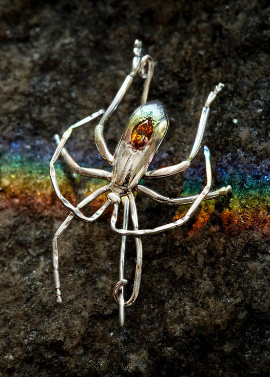 Silver true bug brooch with hand engraving and andaluscite marquise