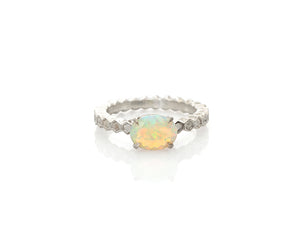 Opal ring with Ethiopian fire opal, claw prongs, silver faceted opal ring with flashes of green, blue, yellow, electric orange and pink, beautiful silver solitaire opal ring