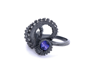 black silver tentacle ring with diamonds and oval color-change sapphire- purple, blue, pink color shift, unehated sapphire, alternative bridal, cephalopod, sculpture, art jewelry, peggy skemp jewelry, peggy skemp