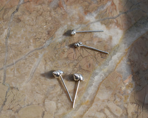 silver shell stud earrings, handcrafted in recycled 925 silver by Peggy 2021. These earrings are for pierced ears and come with solid sivler earring backs. Choose from 4mm mini shells or 6mm medium shells. Send an email if you prefer dangly or larger versions.