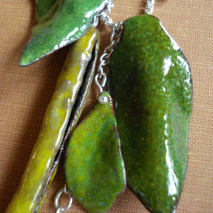 hot glass enamelled one of a kind pea pod and leaf necklace, silver, copper and vitreous enamel by Peggy Skemp 2009.