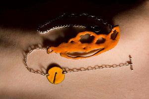 Orange sugar fired vitreous enamel on copper, glass enamel phasmid necklace by Peggy Skemp 2008 from the Sensitive Parasite collection.